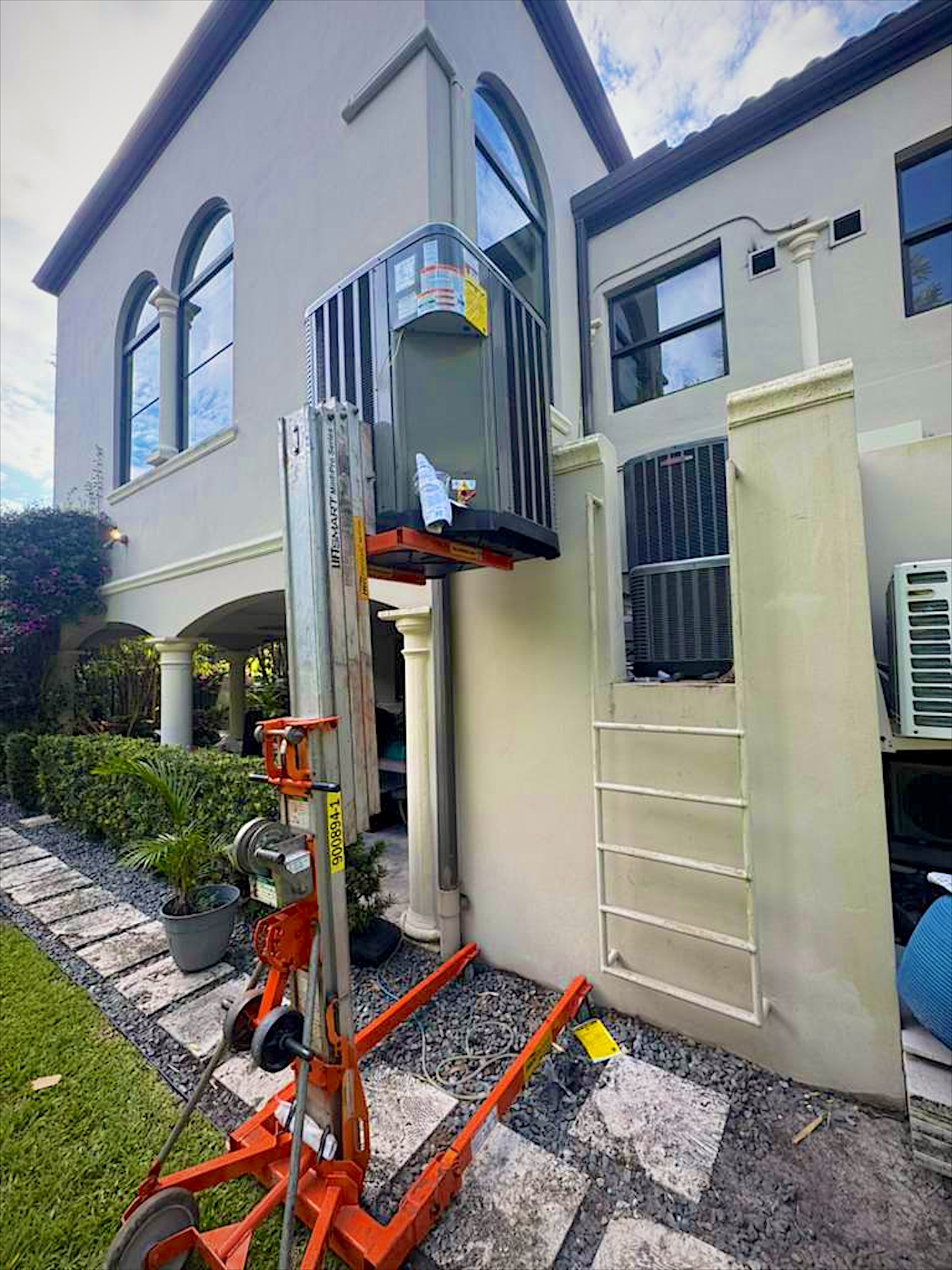 Second-story condenser lift